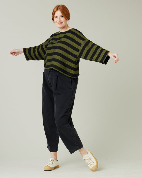 pregnant model wear olive and black stripe linen lily top