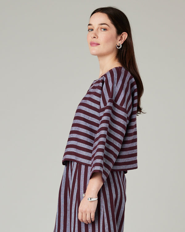 model wears lily cassis stripe linen top