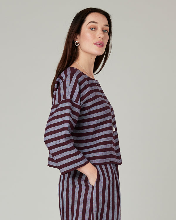 model wears lily cassis stripe linen top