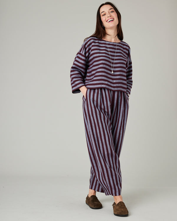model wears lily cassis stripe linen top