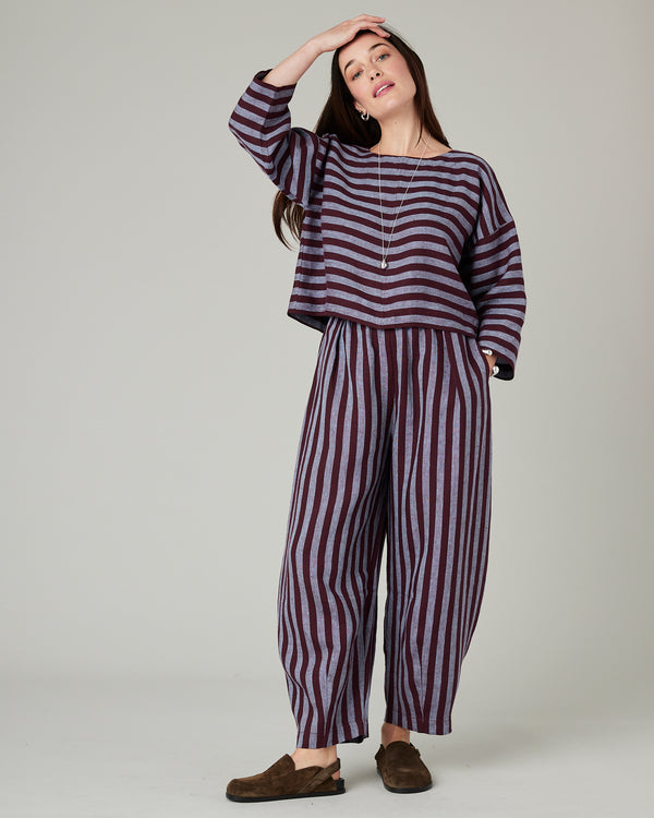 model wears lily cassis stripe linen top