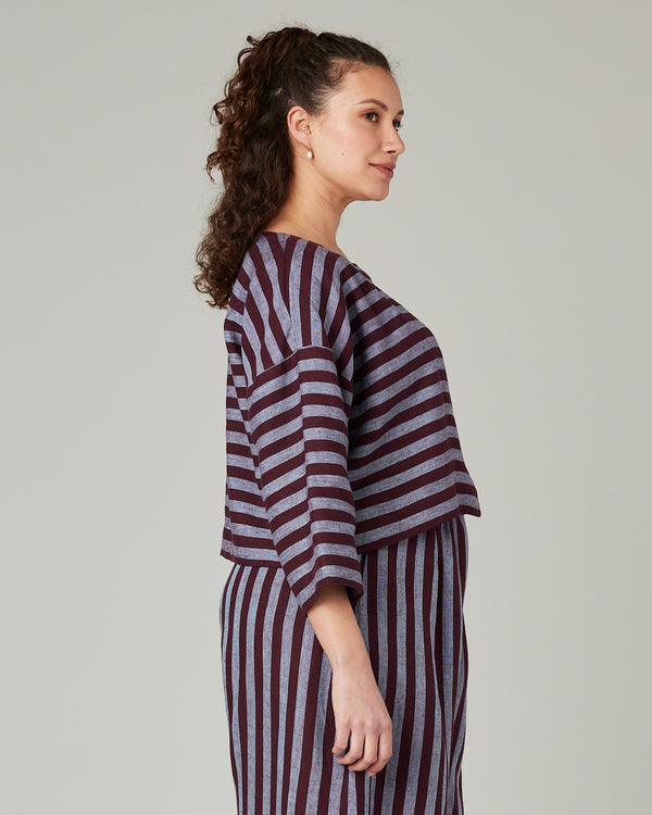 pregnant model wears lily cassis stripe linen top