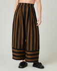 model wears rust stripe bobbi trousers front