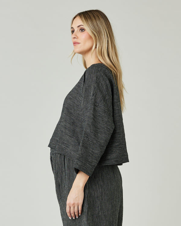 pregnant model wears black and ecru pencil stripe lily top 