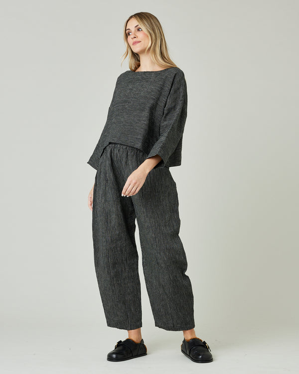 pregnant model wears black and ecru pencil stripe lily top 