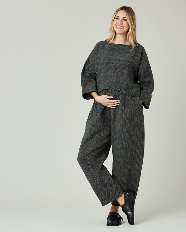 pregnant model wears black and ecru pencil stripe lily top 