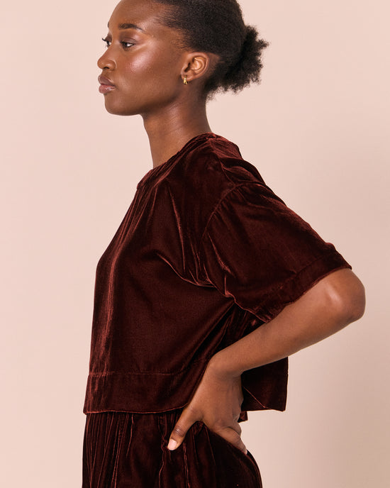 model wears lisa umber velvet top