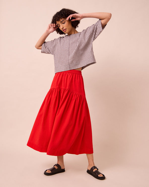 model wears lisa ganache gingham cotton linen top