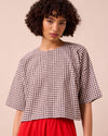 model wears lisa ganache gingham cotton linen top