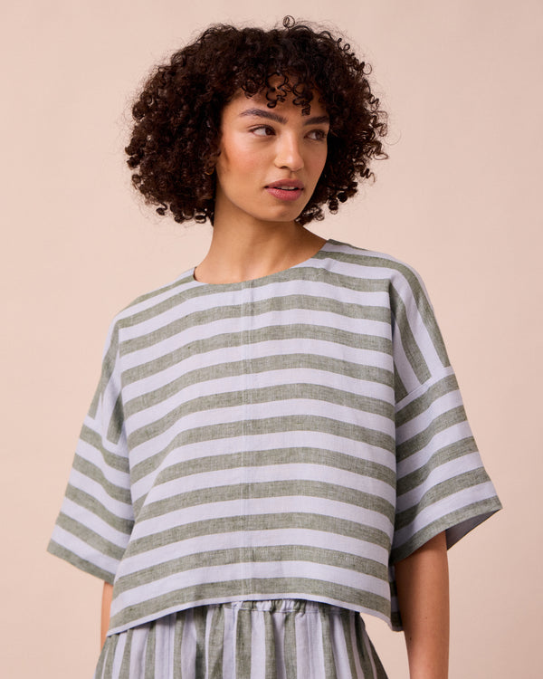 model wears lisa aloe stripe linen top