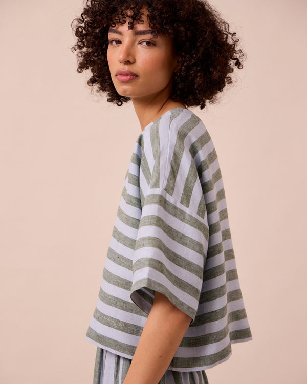 model wears lisa aloe stripe linen top