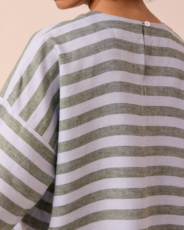 model wears lisa aloe stripe linen top