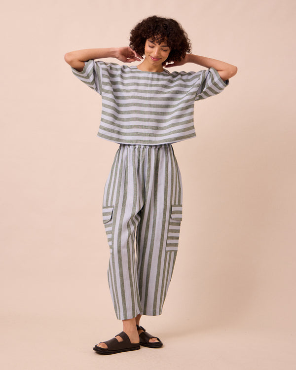 model wears lisa aloe stripe linen top