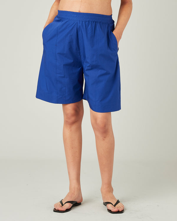 model wears cobalt liv poplin shorts