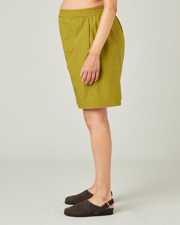 pregnant model wears olive liv poplin shorts