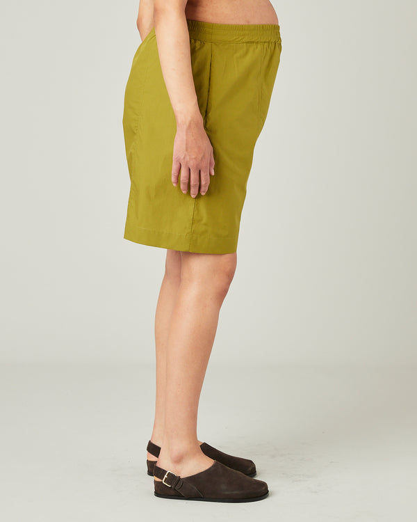pregnant model wears olive liv poplin shorts