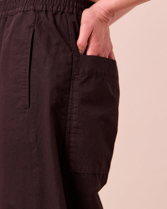 model wears logan cotton linen slub trousers 
