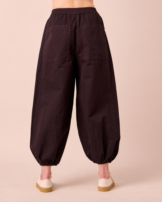 model wears logan cotton linen slub trousers back