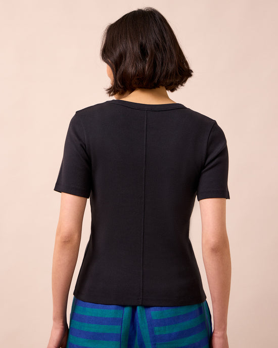 model wears lottie black jersey top