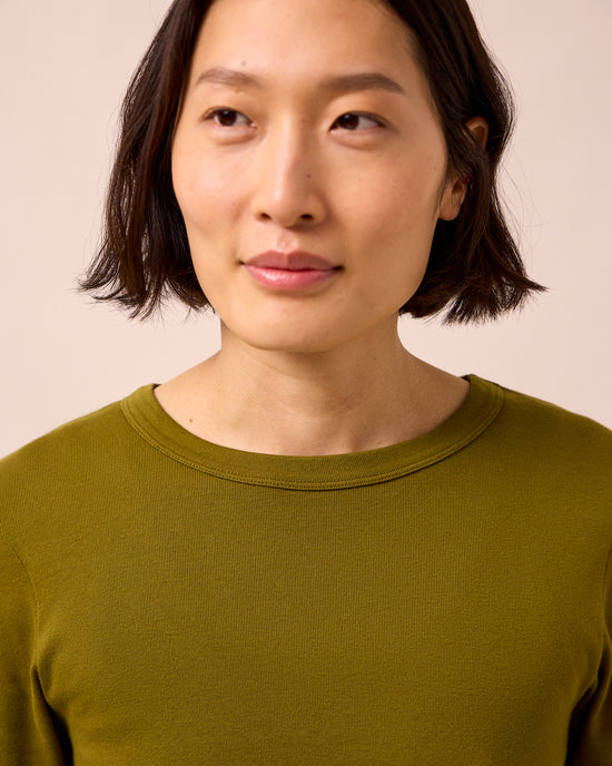 model wears lottie olive jersey top