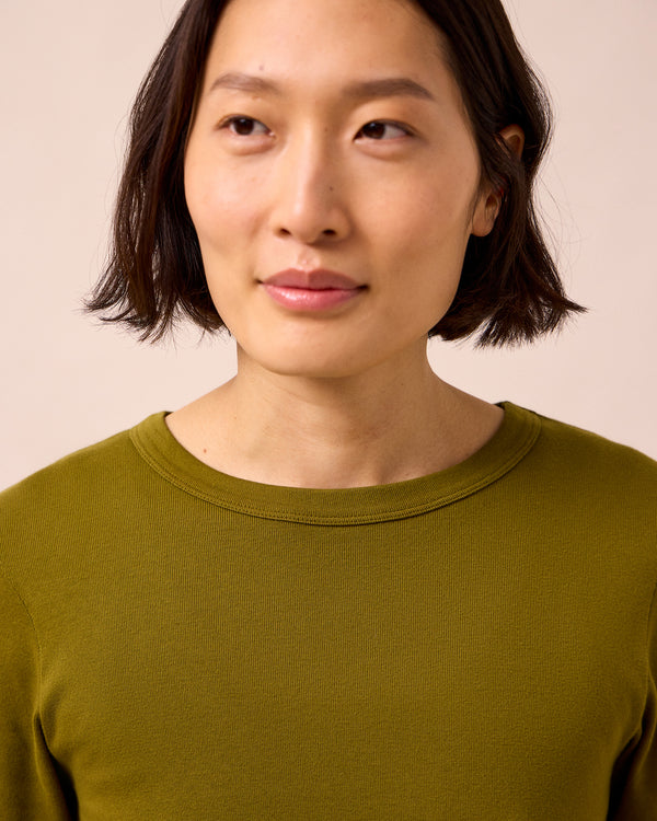 model wears lottie olive jersey top