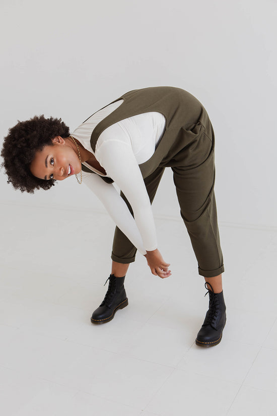 model wears olive jersey laura jumpsuit