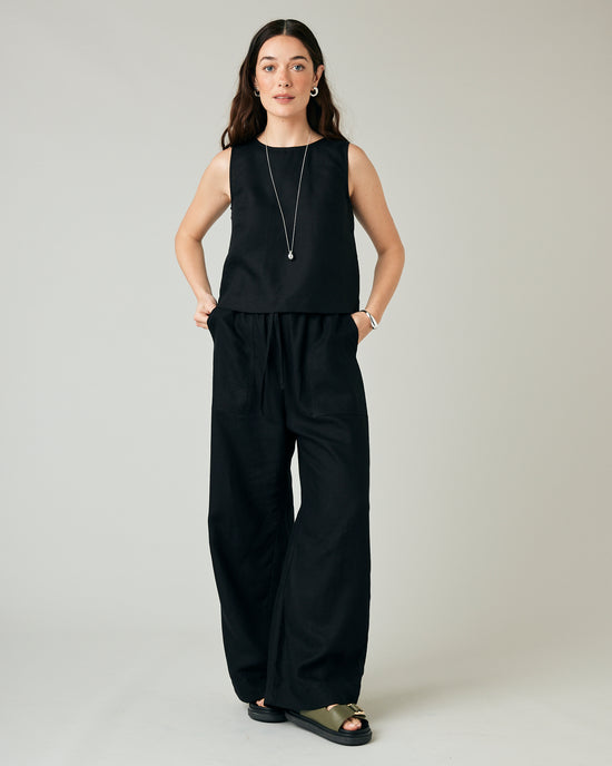 model wears black linen lexi trousers