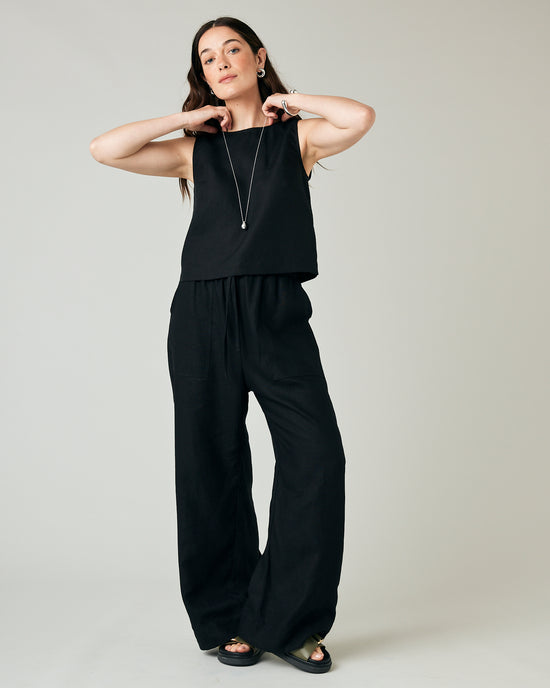 model wears black linen lexi trousers