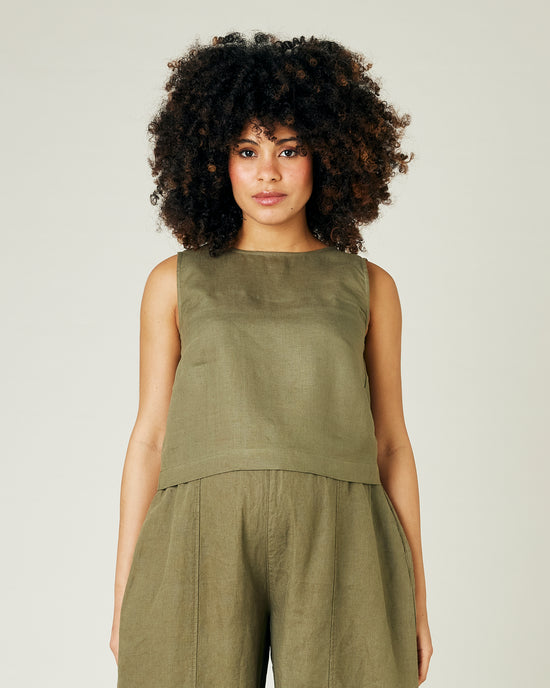 prenant model wears light khaki esme top