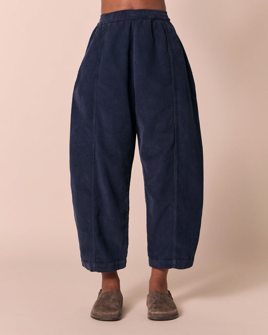 model wears mabel navy cord trousers front