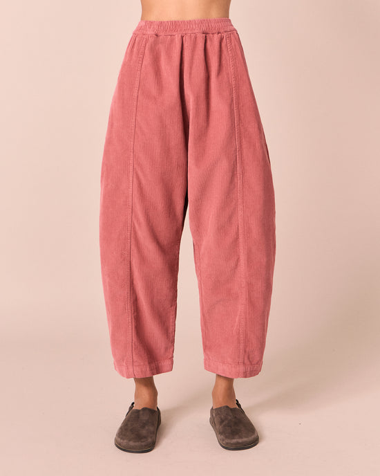 model wears mabel parfait pink cord trousers front