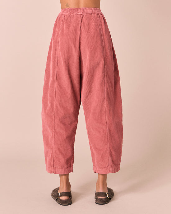 model wears mabel parfait pink cord trousers back