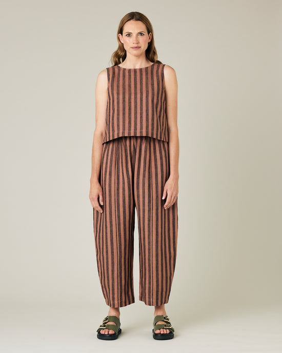 model wears longer length biscuit stripe mabel trousers