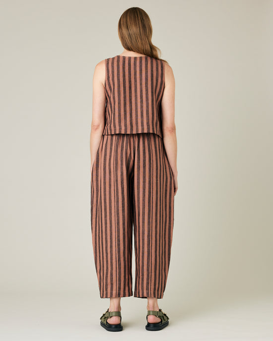 model wears longer length biscuit stripe mabel trousers