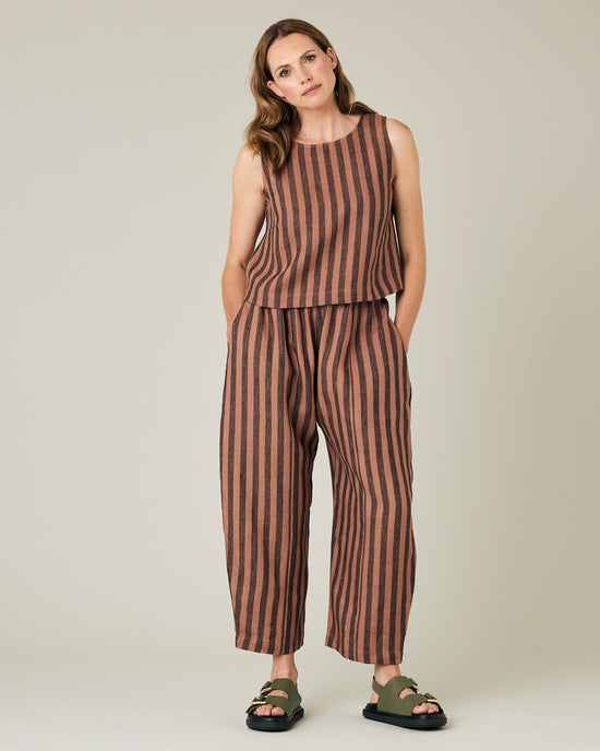 model wears longer length biscuit stripe mabel trousers