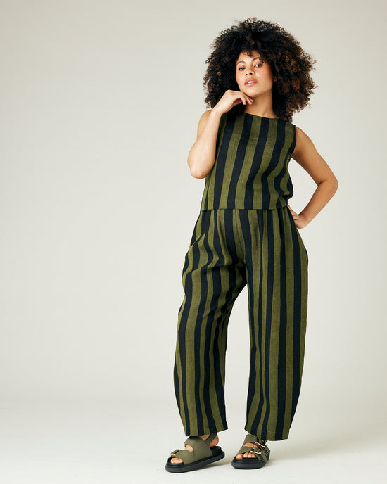 pregnant model wears olive and black stripe linen mabel trousers