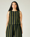 model wears olive and black stripe linen esme top