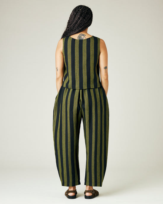 model wears olive and black stripe linen mabel trousers