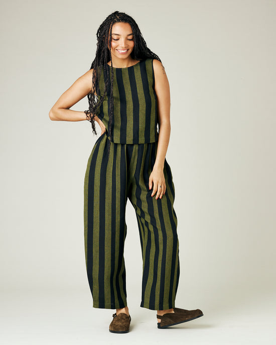 model wears olive and black stripe linen mabel trousers