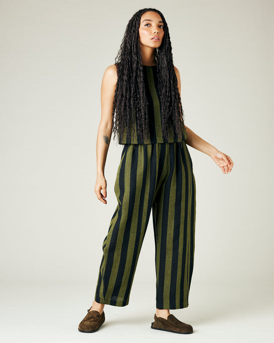 model wears olive and black stripe linen mabel trousers