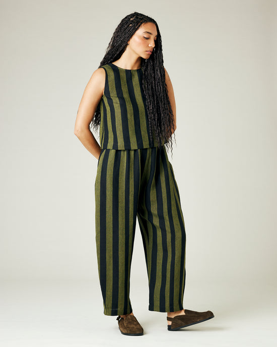 model wears olive and black stripe linen mabel trousers