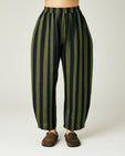 model wears olive and black stripe linen mabel trousers front