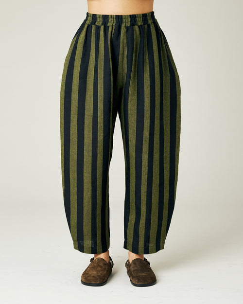 model wears olive and black stripe linen mabel trousers front