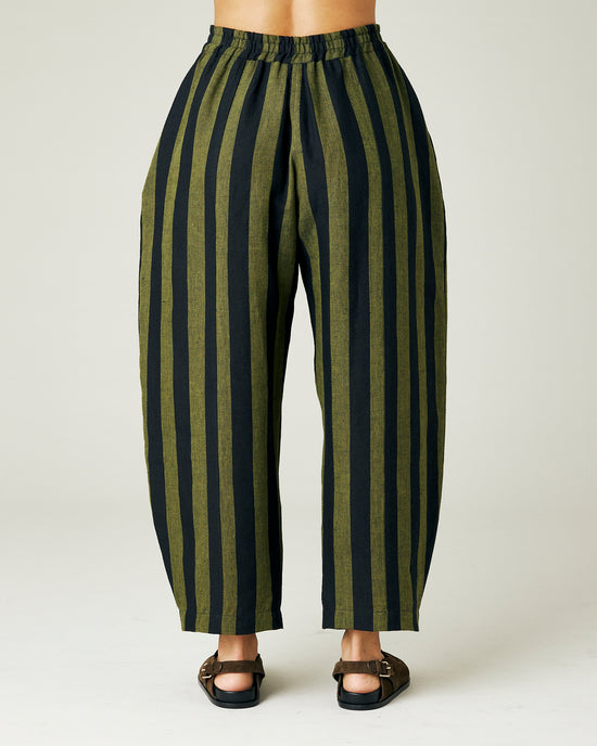 model wears olive and black stripe linen mabel trousers back