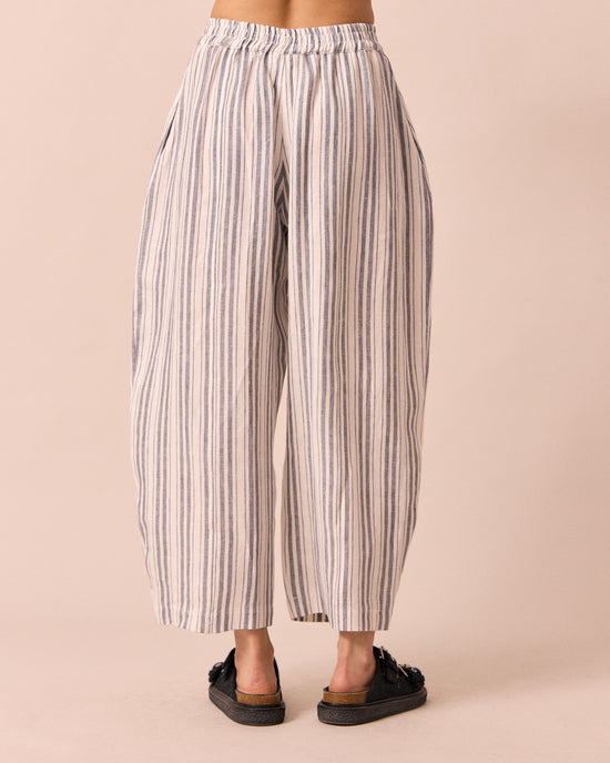 model wears mabel sailor stripe linen trousers back