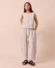 model wears mabel sailor stripe linen trousers left