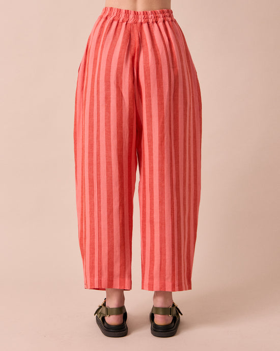 model wears sorbet stripe mabel linen trousers back