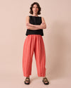 model wears sorbet stripe mabel linen trousers right