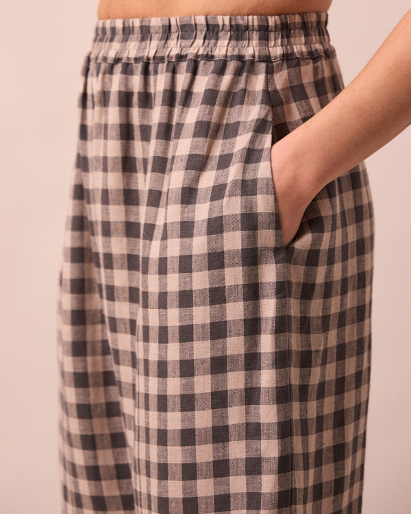 model wears mabel stone gingham linen trousers detail