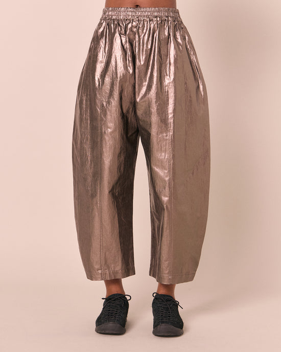 model wears mabel pewter metallic linen trousers front